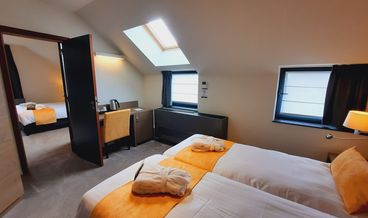 afbeelding van Familiekamer, 1 twee- of 2 eenpersoonsbedden, kamers met tussendeur