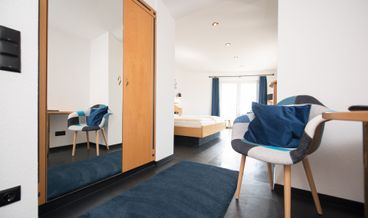 afbeelding van Grote tweepersoonskamer met balkon