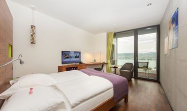 afbeelding van Design tweepersoonskamer, 1 queensize bed, uitzicht op meer