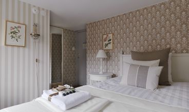 afbeelding van Triple Room, Shared Bathroom (Hilma)-1 Double Bed and 1 Twin Bed Free WiFi Free breakfast