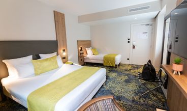 afbeelding van Premium driepersoonskamer, 1 queensize bed met slaapbank