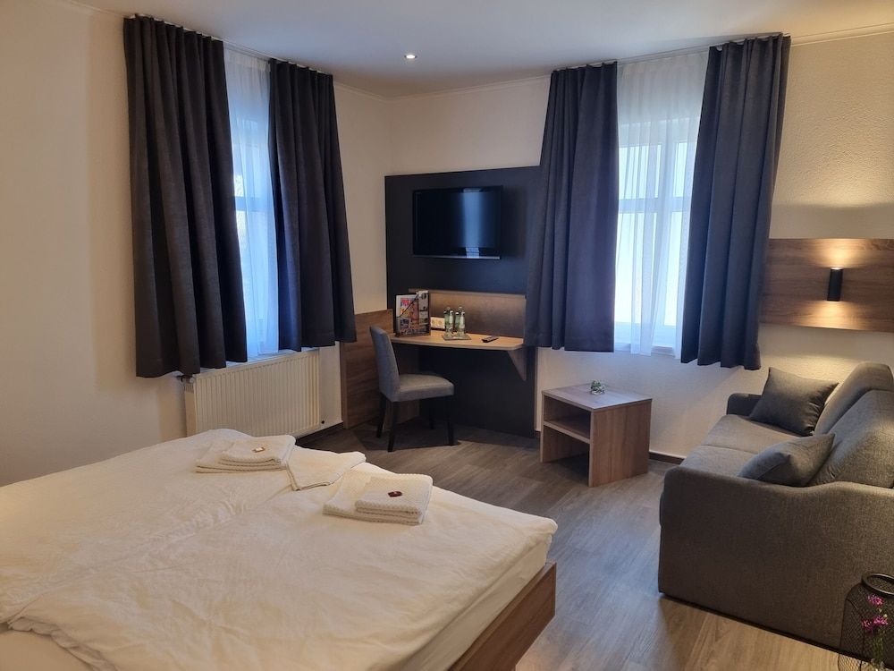 afbeelding van Standaard driepersoonskamer, privébadkamer