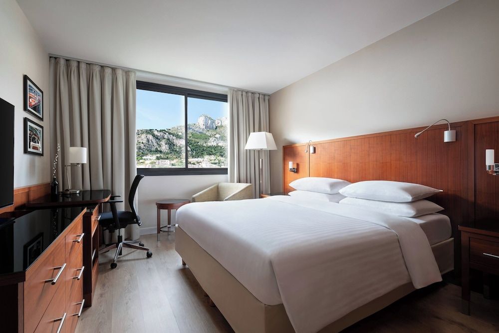 afbeelding van Standaard kamer, 1 kingsize bed, uitzicht op bergen