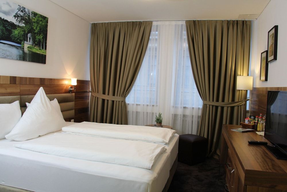 afbeelding van Standaard kamer, 1 twee- of 2 eenpersoonsbedden, en-suite badkamer