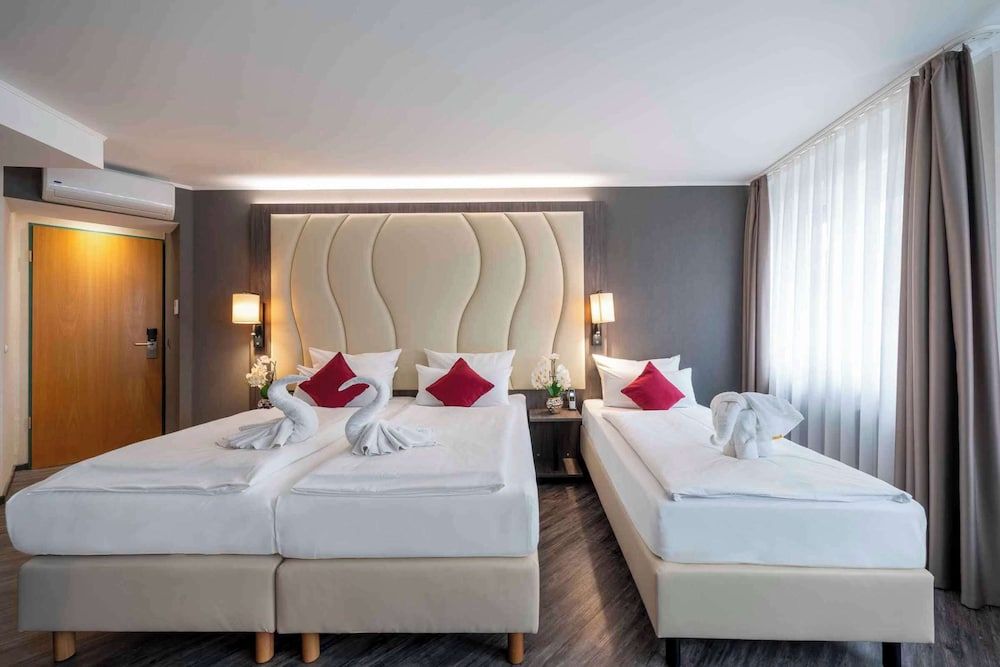 afbeelding van Premium kamer, 3 eenpersoonsbedden (Cozy Sitting Corner)