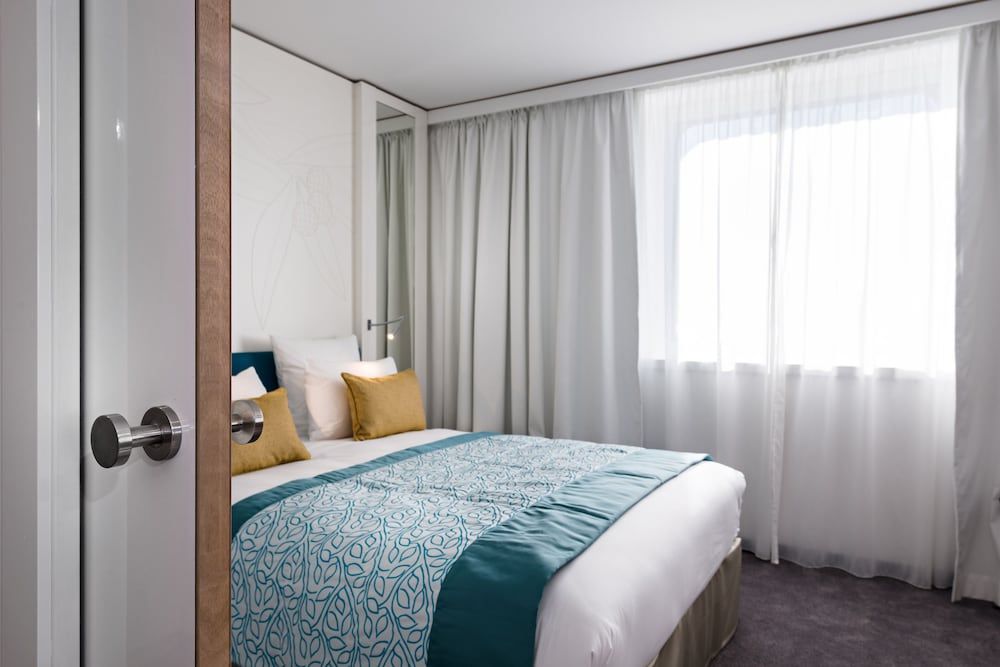 afbeelding van Executive suite, meerdere bedden, uitzicht op zee