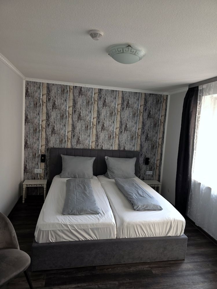 afbeelding van Eenvoudige kamer, 1 twee- of 2 eenpersoonsbedden, 2 eenpersoonsbedden, niet-roken