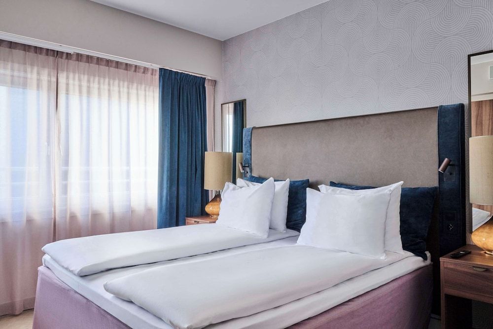 afbeelding van Suite, 1 slaapkamer, balkon, uitzicht op haven