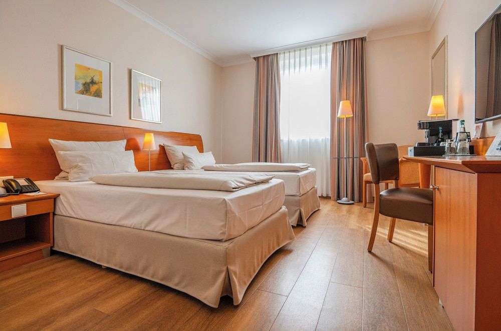 afbeelding van Business kamer, 2 eenpersoonsbedden, uitzicht op tuin