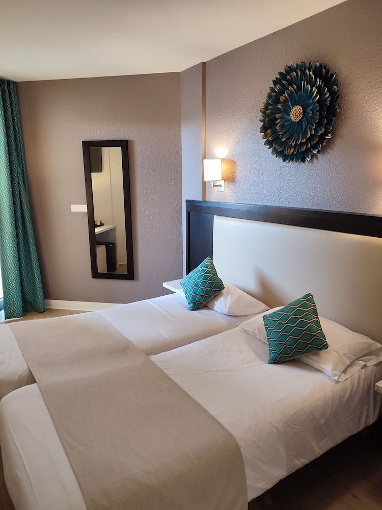 afbeelding van Twin kamer, uitzicht op stad