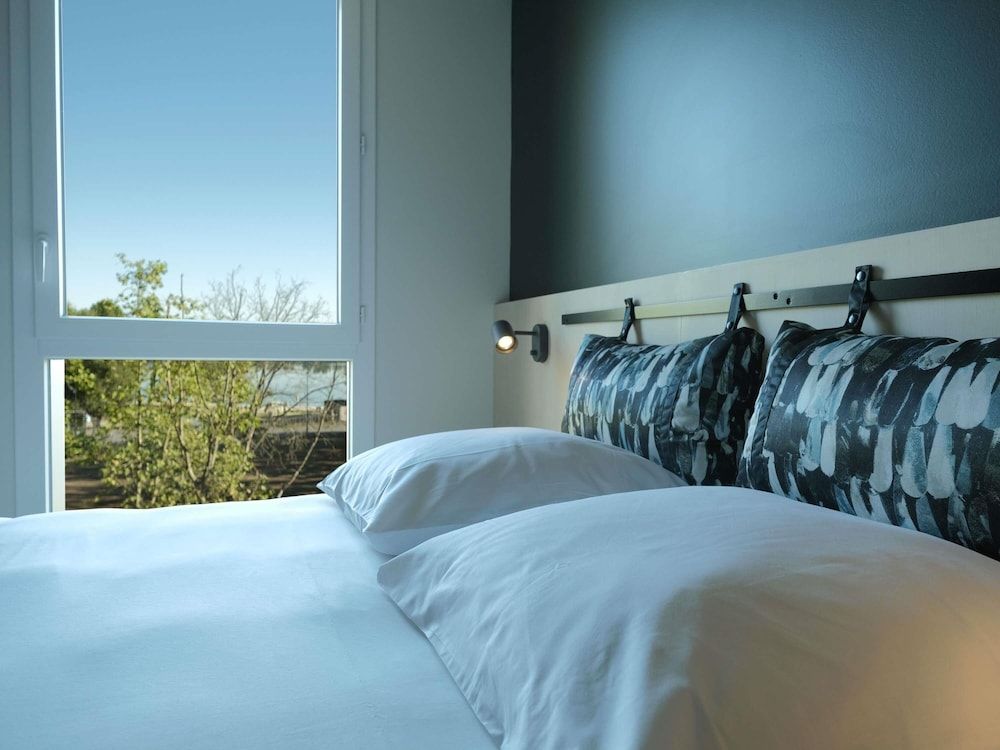 afbeelding van Standaard kamer, 1 tweepersoonsbed, uitzicht op meer
