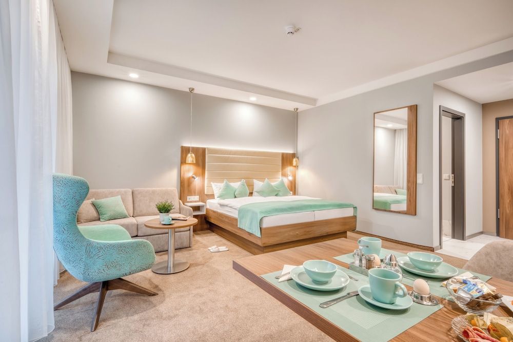 afbeelding van Deluxe tweepersoonskamer, 1 kingsize bed met slaapbank, niet-roken, balkon