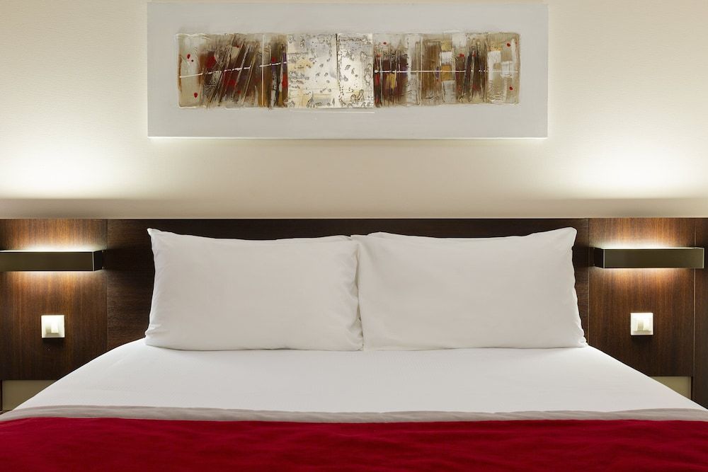 afbeelding van Standaard kamer, 1 queensize bed, uitzicht op meer
