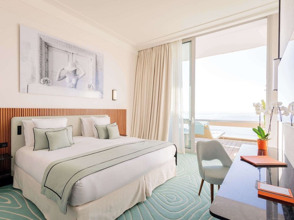 afbeelding van Signature suite, 1 kingsize bed met slaapbank, terras, uitzicht op zee